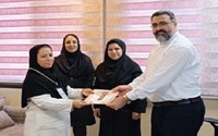 تقدیر و تجلیل از مسئول بهداشت محیط مرکز